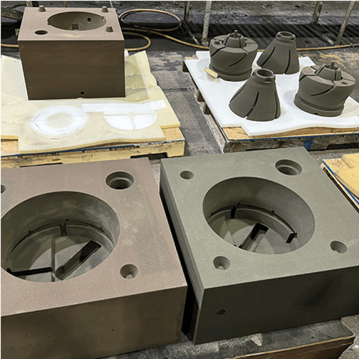  &nbsp; &nbsp; &nbsp;&nbsp;3D-printed molds and cores at Eagle Alloy, ready for assembly 