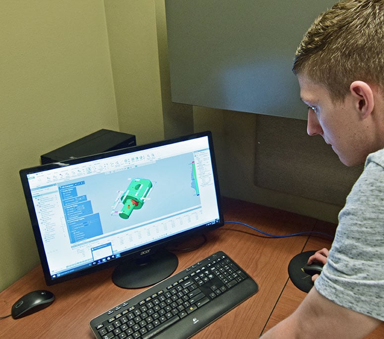 Eagle Alloy Engineer Ryan Horak operates Solid Edge 3D modeling software