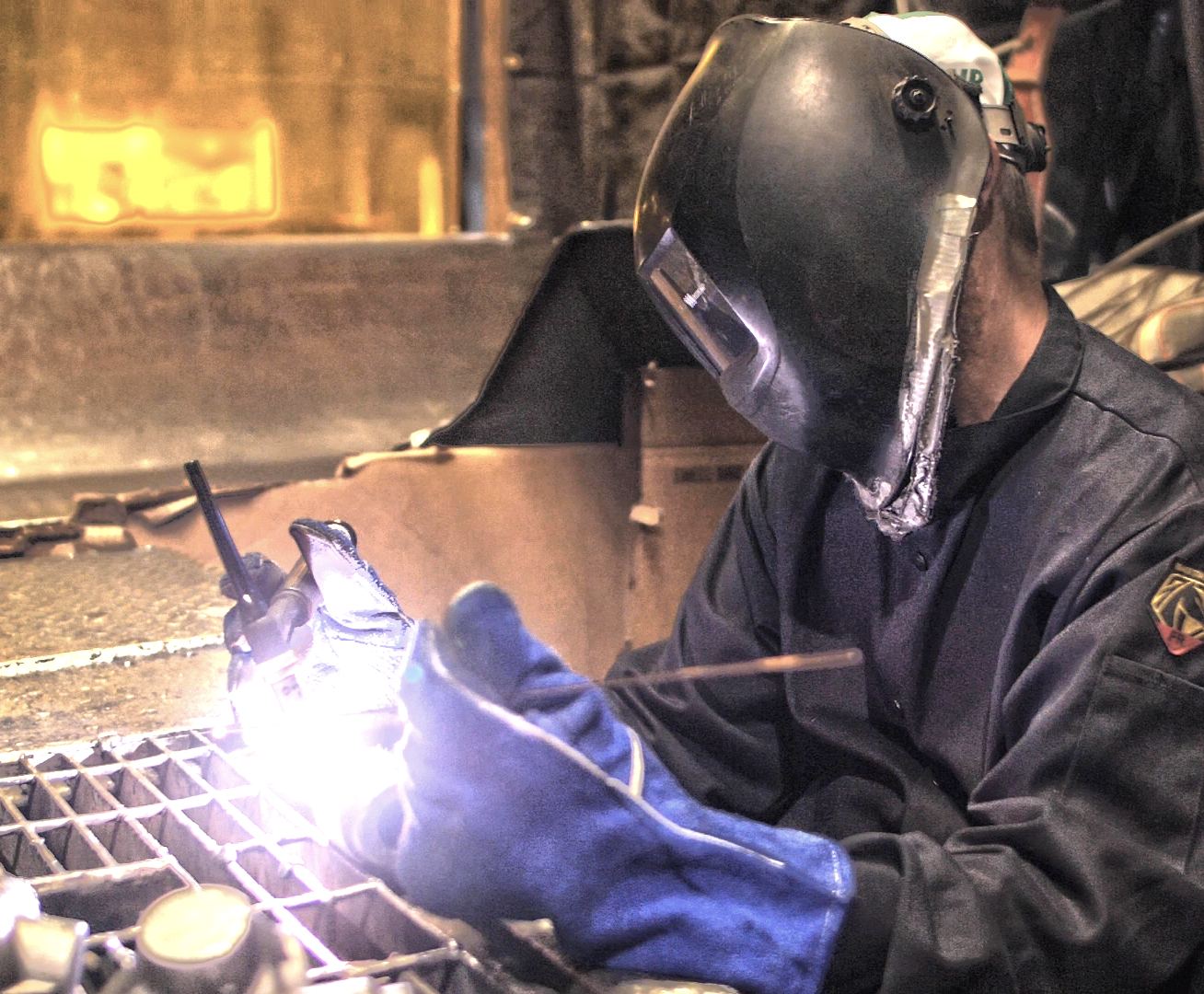 Weld repairing steel castings